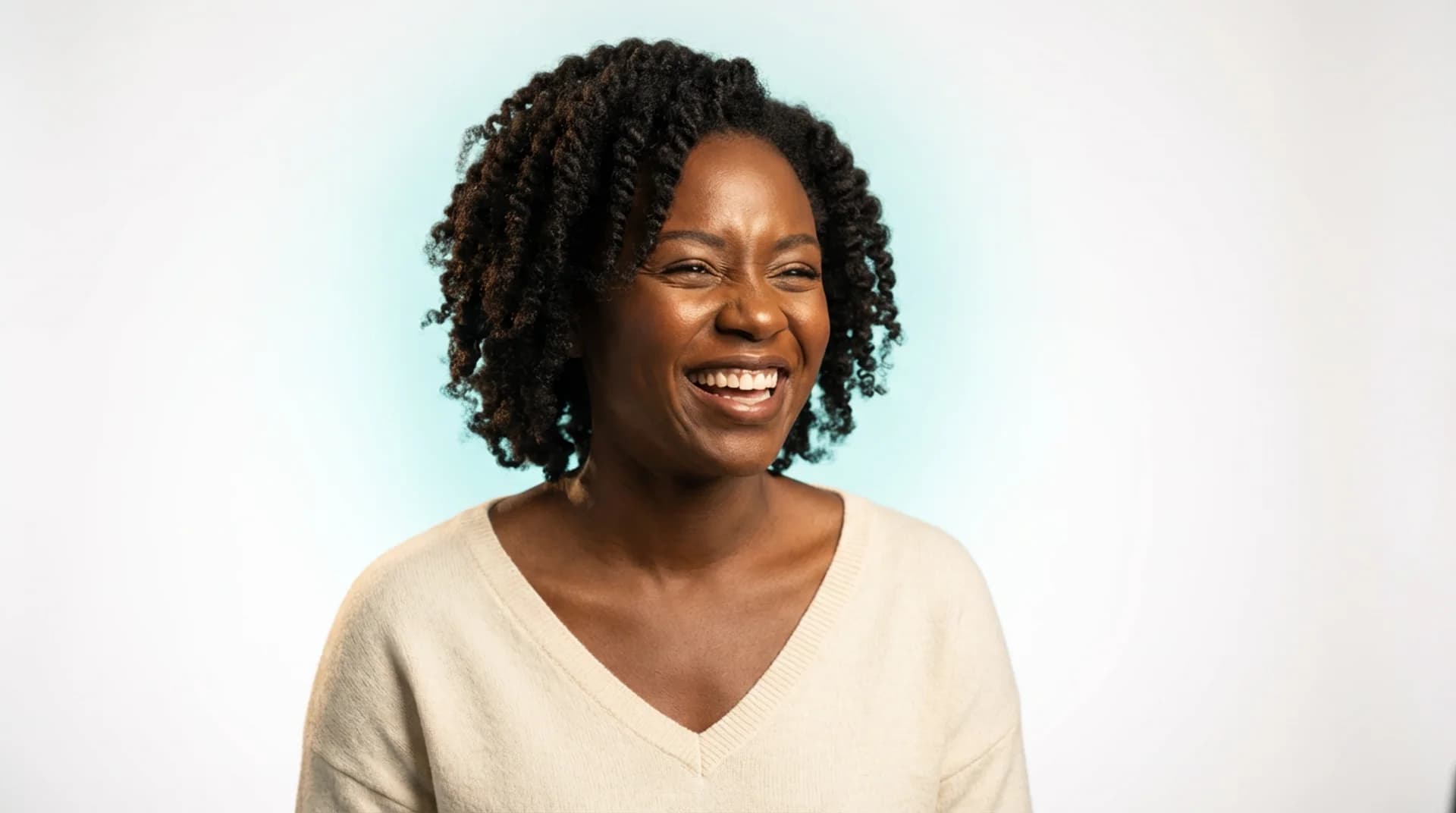 Radiant woman laughing with restored confidence
